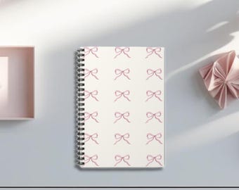 Spiralblock mit Pink Schleife: Liniertes Line Journal für Studenten