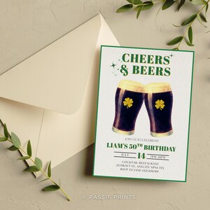 May include: A green-bordered invitation card with the text "Cheers & Beers" and two beer glasses with shamrocks. The card is for Liam's 50th birthday, with the date July 14th. An envelope and greenery are also present.