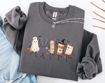 Sweat-shirt d'infirmière d'Halloween, pull ras du cou effrayant sur le thème de la santé, cadeau pour le personnel médical, pull pour le personnel hospitalier