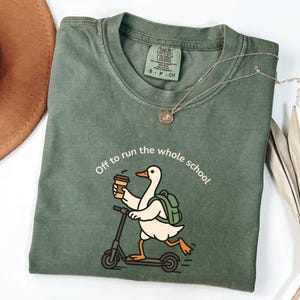 May include: A handmade wooden sign with the text "Welcome" in a handwritten style. The sign is painted white with a distressed finish and features a small, decorative heart. It is designed for indoor or outdoor use.