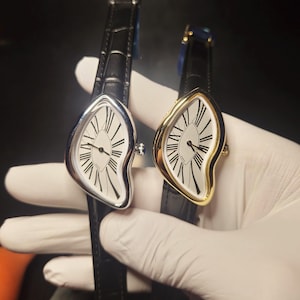 Crashwatch in goud + zilver, leren alligatorband + vouwsluiting