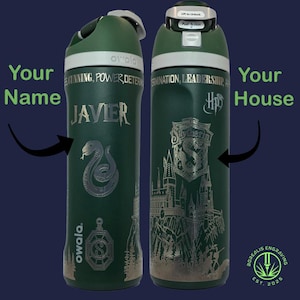 May include: A green Owala water bottle with a silver engraved design. The bottle features the name "JAVIER" and a snake emblem on one side, and a Hogwarts crest on the other. The lid is green and white.