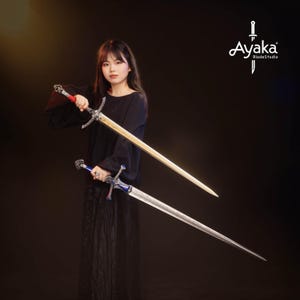 May include: Two swords with ornate silver hilts and long blades. One sword has a gold blade and red accents on the hilt, while the other has a silver blade with blue accents. The swords are displayed against a dark background.
