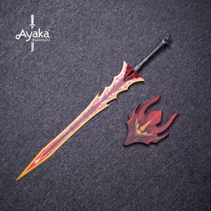May include: A fantasy sword with a red and yellow blade, a black handle, and a matching red shield. The sword has a decorative design and the text "Ayaka BladeStudio".
