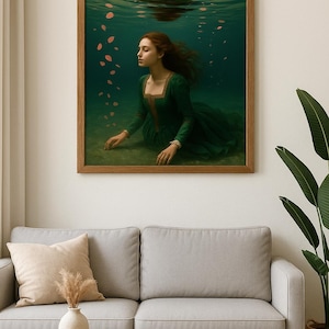 May include: A framed art print showing a woman in a green dress underwater. The artwork presents a tranquil scene with the woman's hair flowing, surrounded by floating petals. The wooden frame complements the artwork's serene theme.
