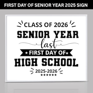 May include: A white framed sign with black text. The sign reads "CLASS OF 2026 SENIOR YEAR last FIRST DAY OF HIGH SCHOOL 2025-2026". The sign is designed for the first day of senior year.