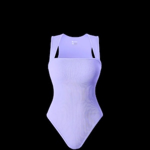 May include: A light purple ribbed bodysuit with a square neckline and shoulder straps. The one-piece garment has a high-cut leg and a scoop back. The fabric appears to be a soft, stretchy material.