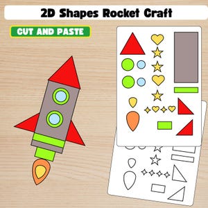 Puede incluir: Una actividad de manualidades para niños con un cohete hecho de formas geométricas. La imagen incluye el texto "2D Shapes Rocket Craft" y "Cut and Paste". El cohete es gris, rojo y verde.