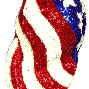 Sequined USA flag cap with red and white wavy stripes and blue star field; unisex hat with adjustable strap.