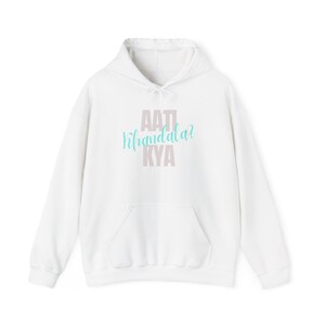 May include: White hooded sweatshirt with a front pocket and drawstring. The front of the sweatshirt features the text "AATI, Kifandala? KYA" in a light purple and teal color.
