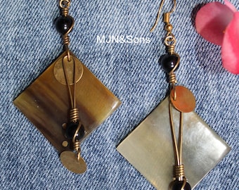 Handcrafted diamond-shaped earrings made from natural horn and brass wire