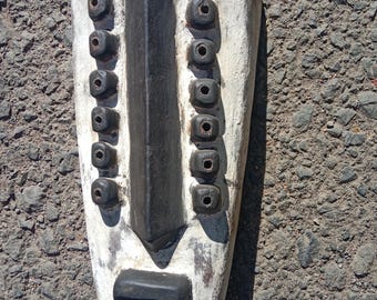 A white-painted West African Grebo Wooden Decor Wall Mask
