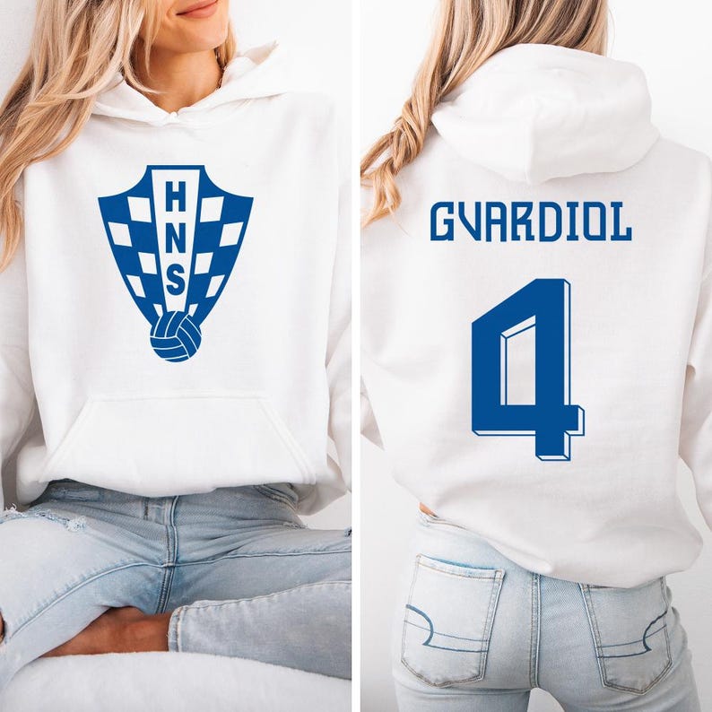 A white hoodie with a blue logo and the number 4 on the back, along with the name 'GVARDIOL' printed on the back.