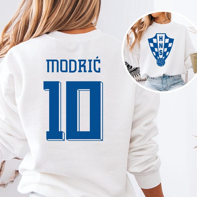 A white sweatshirt with the number 10 and the name "Modric" printed on it.