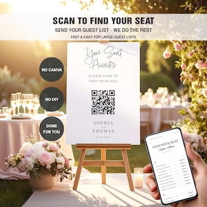 May include: A wedding seating chart sign on a wooden easel. The sign reads "Your Seat Awaits" with a QR code and the names Sophia and Thomas. A phone displays a digital seating chart. The background includes floral arrangements and a table setting.