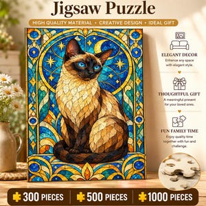May include: A rectangular jigsaw puzzle featuring a Siamese cat with blue eyes centered against a stained glass background of blue, yellow, and brown geometric patterns. The text Jigsaw Puzzle appears at the top, with 300, 500, and 1000 pieces listed at the bottom.