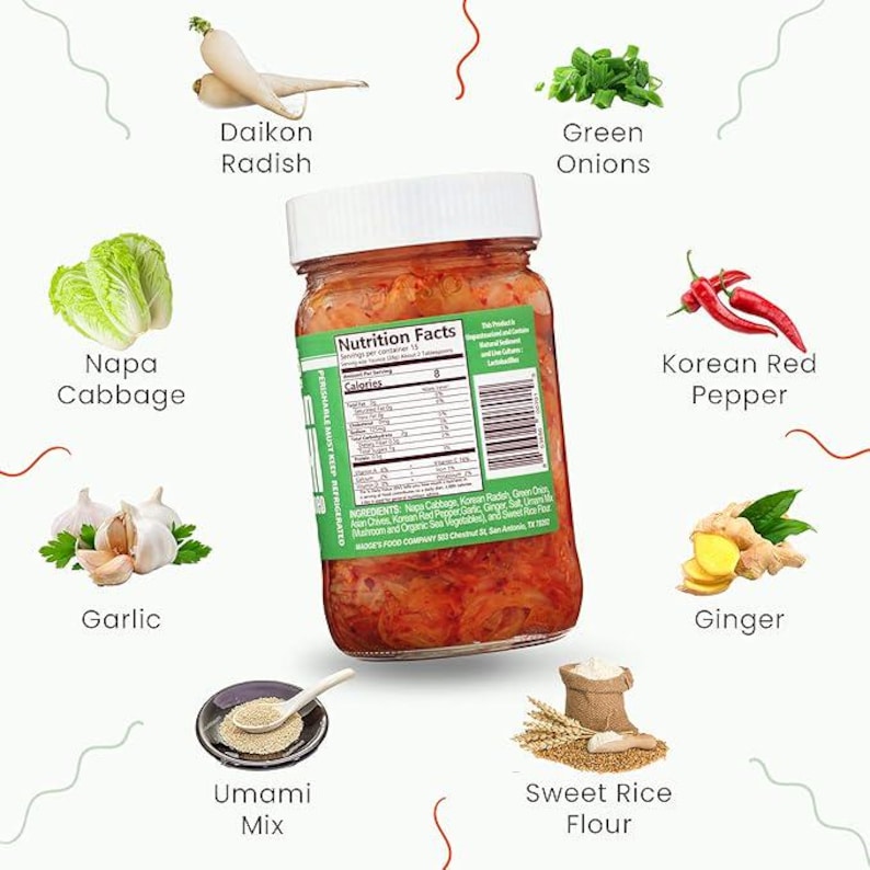 May include: A glass jar of kimchi with a white lid, surrounded by ingredients including Napa cabbage, daikon radish, green onions, and Korean red pepper. The label displays nutrition information. Other ingredients include garlic and ginger.
