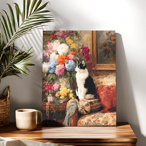 May include: A canvas print depicting a black and white cat on a floral sofa. The artwork displays a colourful bouquet of flowers, with pink, blue, and orange blooms. The image has a classic, decorative theme.