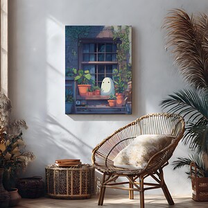 May include: A framed canvas art print depicts a whimsical scene of a window with potted plants and a cartoon ghost character. The artwork is set against a stone wall, with a wicker chair and side table in the foreground, creating a cozy, inviting atmosphere.