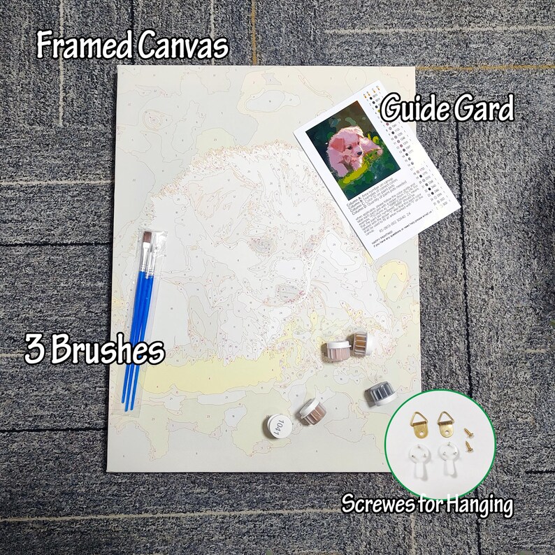 May include: A paint-by-numbers kit featuring a framed canvas with a dog outline, three blue paintbrushes, paint pots, a guide card, and screws for hanging. The canvas is labeled "Framed Canvas".