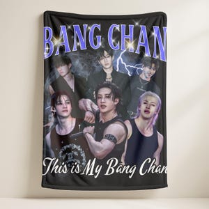 May include: Black throw blanket with a collage of six people. The text "BANG CHAN" is in light blue at the top. The words "This is My Bang Chan" are in white script at the bottom of the blanket.