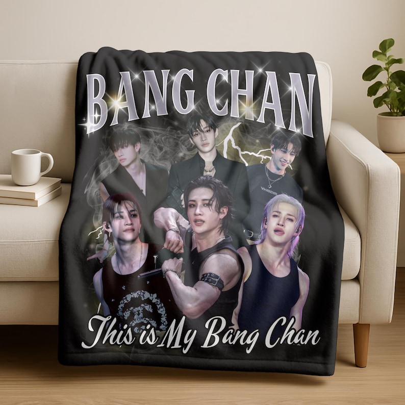 May include: Black throw blanket with a graphic of six people and the text "BANG CHAN" in a silver, stylized font. The phrase "This is My Bang Chan" is printed at the bottom in white.