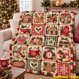 May include: A cream-colored throw blanket featuring a grid of festive Christmas-themed squares, including gingerbread people, a red kitchen scale, a rolling pin, a red oven mitt, a mug of hot cocoa, and various holiday treats with red and green accents.