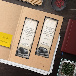 May include: Two brown bookmark designs with a black and white image of a person praying with the text "Happy Father's Day" and a bible verse. The verse is "The righteous man walks in his integrity: His children are blessed after him. Proverbs 20:7"