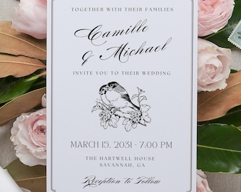 Pode incluir: Um cartão de convite de casamento retangular branco com texto preto e um desenho de linha em preto e branco de dois pássaros em um galho. O texto diz: Together with their families, Camille & Michael, invite you to their wedding, March 15, 2031, 7:00 PM, The Hartwell House, Savannah, GA, Reception to Follow.