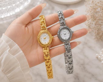 Relógio de quartzo elegante com mostrador oval: Pulseira em liga de ouro e prata.