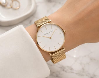 Relógio feminino com pulseira de malha de aço inoxidável, movimento de quartzo japonês, à prova d'água, minimalista e luxuoso.