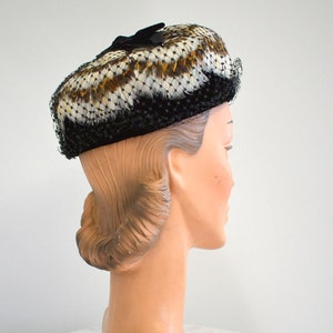 1960s Black, Brown, and White Feather and Netting Hat