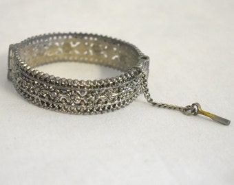 Vintage Silver Bangle Bracelet with Peg Closure