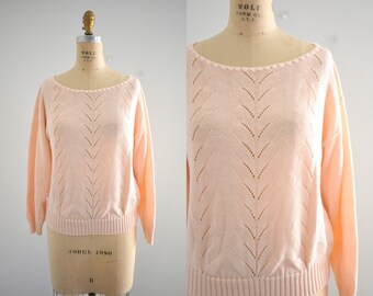 light peach sweater