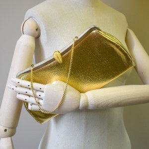 1960s Metallic Gold and Silver Vinyl Clutch Bag