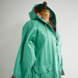 1990s Green Vinyl Hooded Raincoat with Plaid Lining