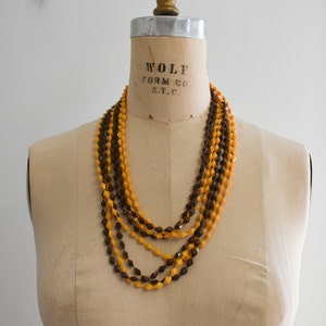 1960s Golden Yellow and Brown Plastic Bead Long Necklace