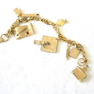 1962 Coro Graduation Charm Bracelet