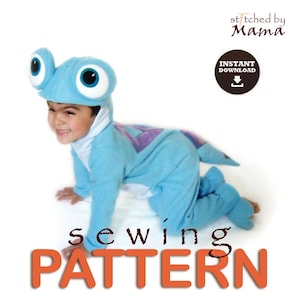 May include: A blue and purple baby dinosaur costume sewing pattern. The pattern includes a hooded jumpsuit with large eyes and a tail.