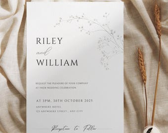 May include: A white wedding invitation with the names "RILEY and WILLIAM" in black text. The invitation includes the text "REQUEST THE PLEASURE OF YOUR COMPANY AT THEIR WEDDING CELEBRATION" and details for the event. A floral design is in the upper right corner.