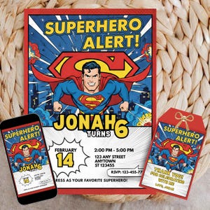 May include: Superhero-themed birthday party invitation set. The invitation features Superman with the text "Superhero Alert!" and "Jonah Turns 6". Includes a matching thank you card and a smartphone displaying the invitation.