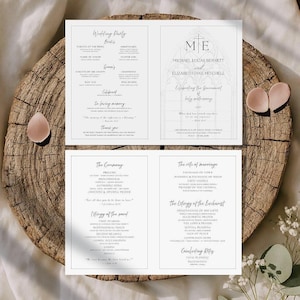 May include: A wedding program with a minimalist design. The program features the names Michael Lucas Bennett and Elizabeth Jane Mitchell, along with the wedding ceremony details. The program is printed on white paper and is displayed on a wooden surface.