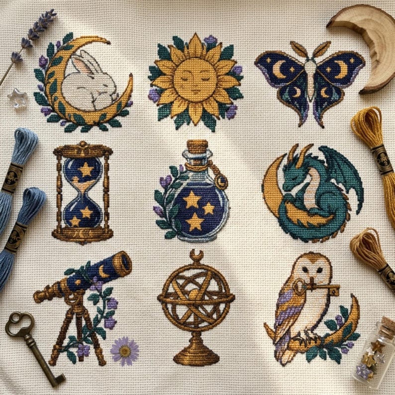 May include: A cross-stitch pattern on white fabric featuring nine motifs: a rabbit on a crescent moon, a sun, a moth, an hourglass, a potion bottle, a dragon, a telescope, an armillary sphere, and an owl holding a key, with embroidery floss.