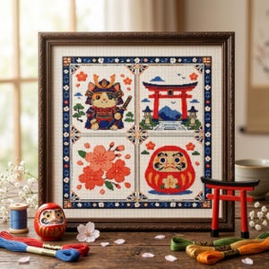 May include: A framed cross-stitch embroidery featuring four distinct panels: a cat dressed as a samurai, a red torii gate, pink cherry blossoms, and a red Daruma doll. The artwork is enclosed in a dark brown wooden frame with a decorative border.