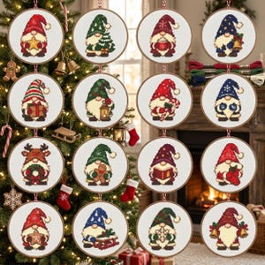 May include: A collection of sixteen circular embroidery hoops featuring cross-stitch designs of Christmas gnomes. Each gnome wears a unique hat and holds a holiday-themed item such as a star, tree, gift, lantern, candy cane, or bell.