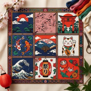 Op de afbeelding: Een vierkant kruissteek borduurwerk met een raster van negen panelen met Japanse motieven, waaronder de berg Fuji, kersenbloesems, een torii-poort, koikarpers, een waaier, een wenkende kat, een golf, een lantaarn met tekst en een daruma-pop.
