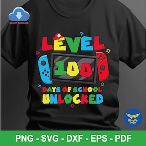 May include: Black t-shirt with a colourful graphic design. The design features the words "LEVEL 100" with a video game controller theme. The text "DAYS OF SCHOOL UNLOCKED" is also included. The shirt is a digital download.