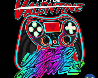 May include: Black graphic design featuring a video game controller with the text "V is for Valentine" in red and white, and "Video Games" in blue, green, and purple. The controller has a red screen with a heart.