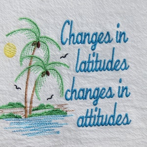 Pode incluir: Desenho bordado de duas palmeiras com um sol amarelo e água azul. O texto diz "Changes in latitudes changes in attitudes".