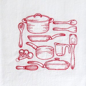 May include: A red embroidered kitchen towel with a design of various kitchen utensils, including a pot, a pan, a measuring cup, a spatula, and spoons.